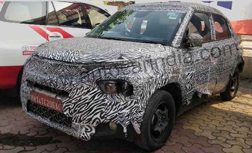 Upcoming tata hbx suv spied with an amt