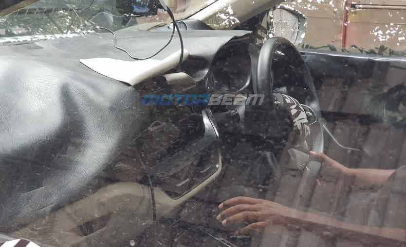 Skoda rapid successor interior revealed in spy shots