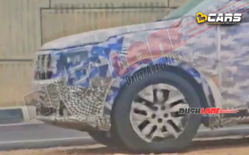 2025 mahindra xuv700 facelift spied with triple screen layout