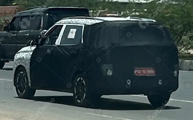 Kia carens facelift spied with ev5 inspired design