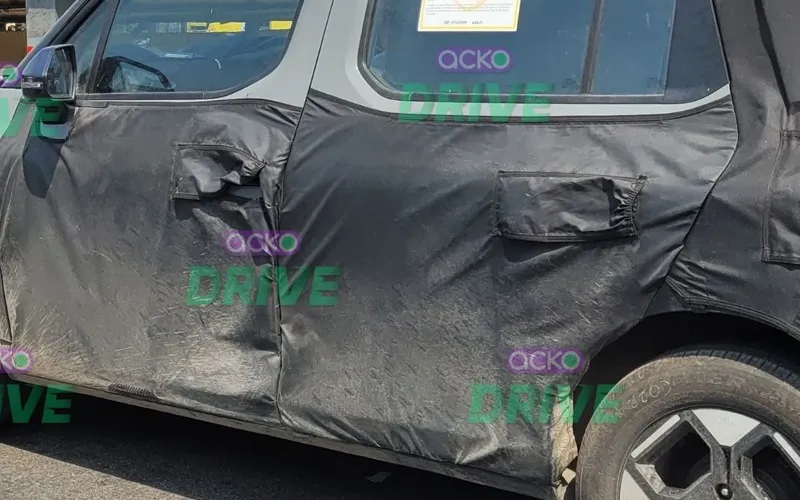 Kia clavis small suv spied in india for the first time