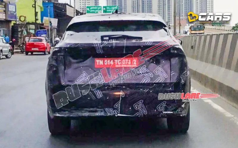 Camouflaged nissan ariya ev spotted on test in india